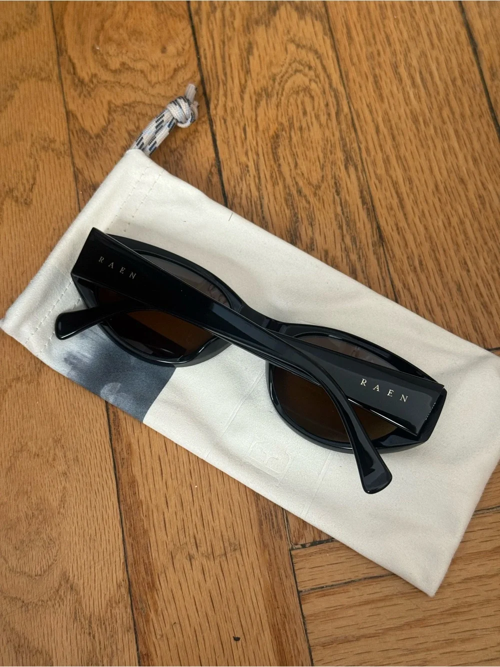 RAEN Black Oval Women's Sunglasses